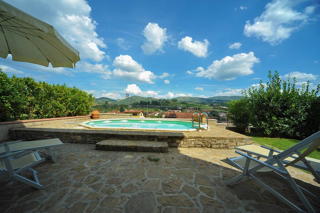 The swimming-pool and the view from the house