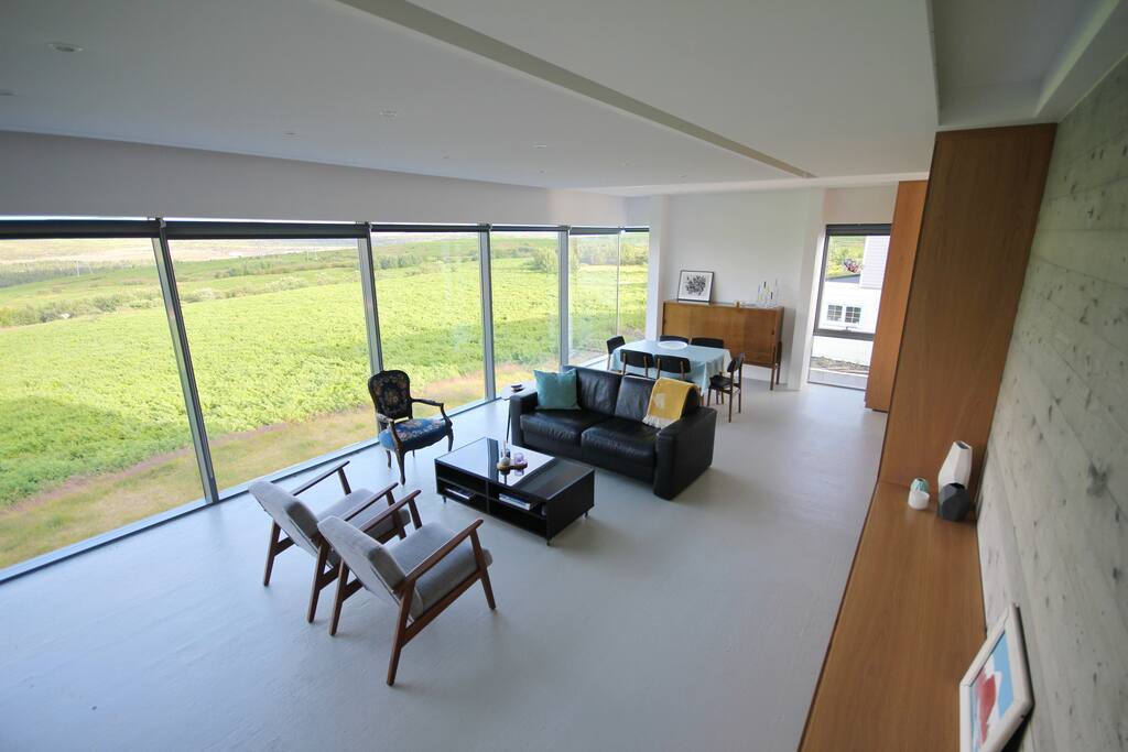The living room is spacious and bright