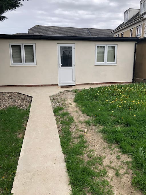 2 bed extension at the rear of main building.