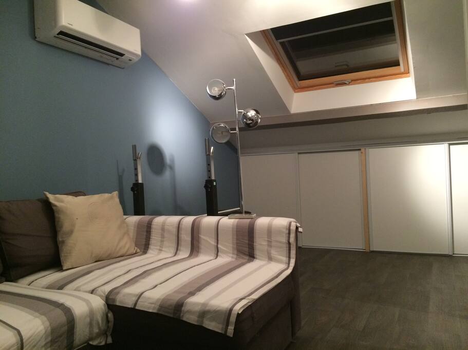 Grande chambre avec climatisation
