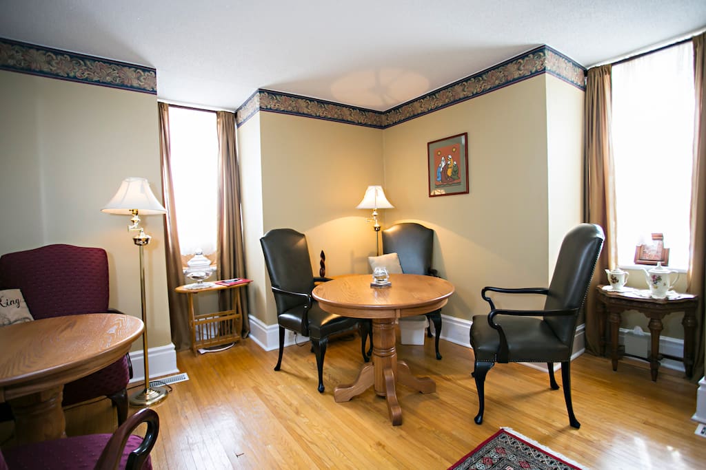 This cosy dining room seats 8 . Relax in this multipurpose room with a fireplace, television & DVD player.