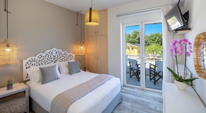 Schlafzimmer im 2. Zwischengeschoss mit eigenem Balkon.