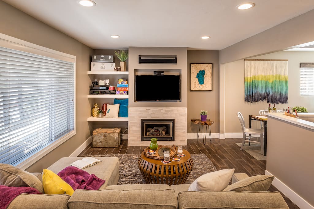 The living room has plenty of seating to enjoy the HDTV or the gas fireplace.