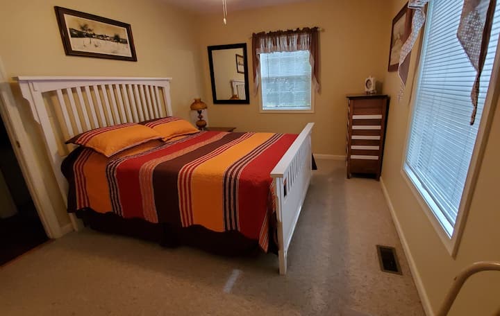 Bedroom with queen bed.