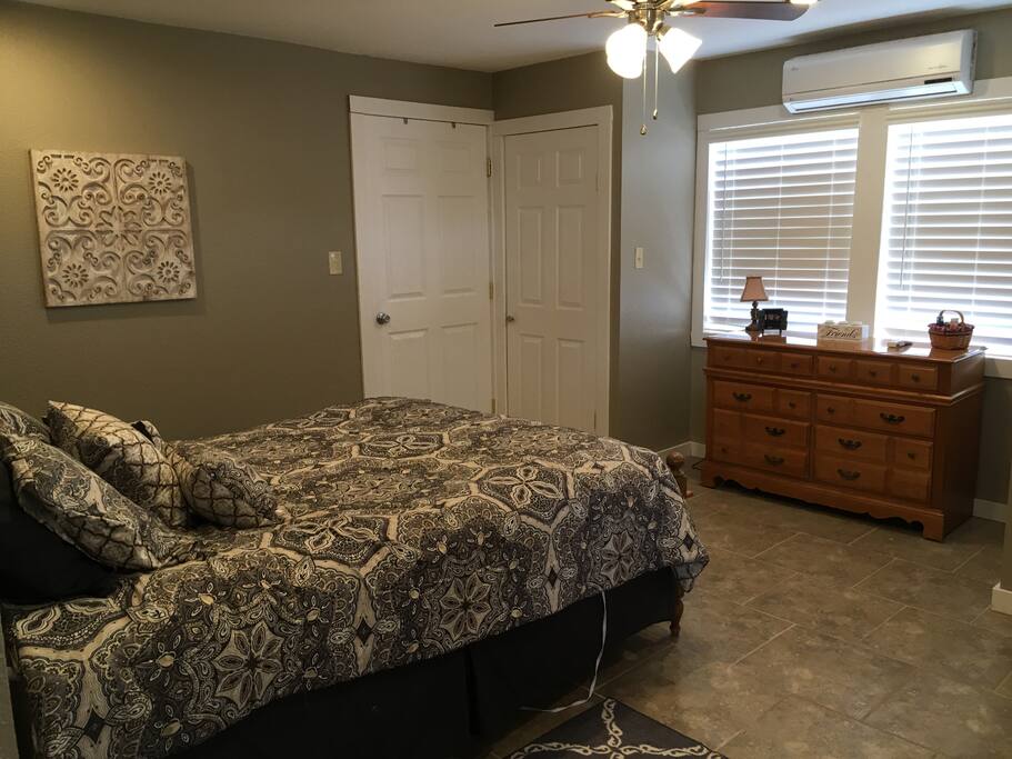 Bedroom with entrance to bathroom