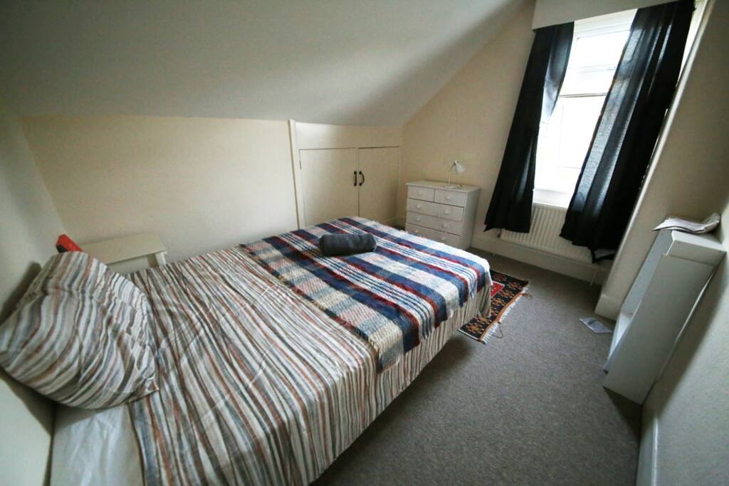 top floor double bedroom with garden view