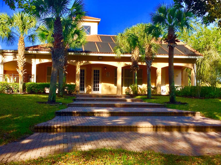 Beautiful walk way leading to a lake front barbecue space.
