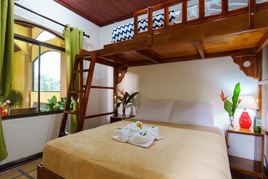 Condo 2, bedroom 1: Queen size bed with single top bunk.