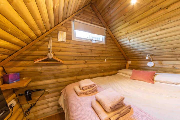 Bedroom area with hairdryer, hangers, unserved storage and heater 