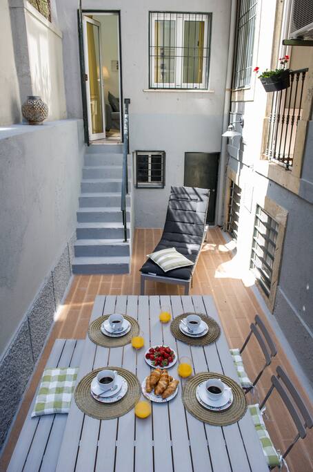 The beautiful little outdoor terrace, typical for Lisbon buildings