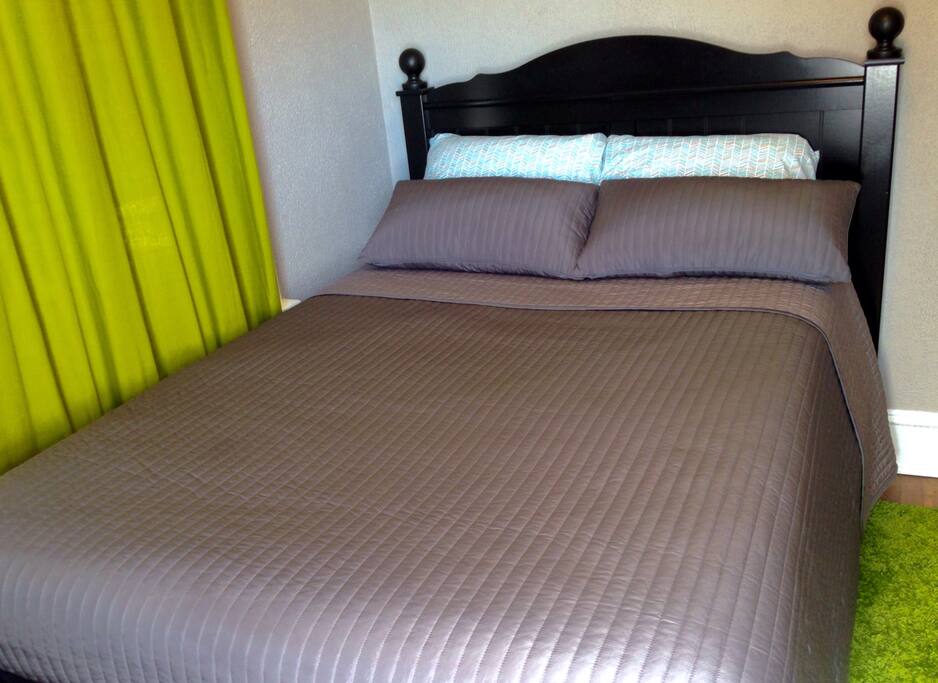 New full sized mattress. We use water/bug proof mattress and pillow covers and will always use freshly laundered bedding and provide clean towels for guests.