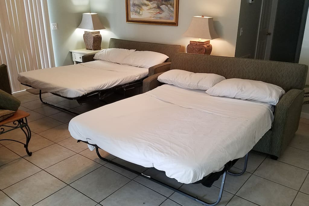 Living room has 2 Sofa Beds