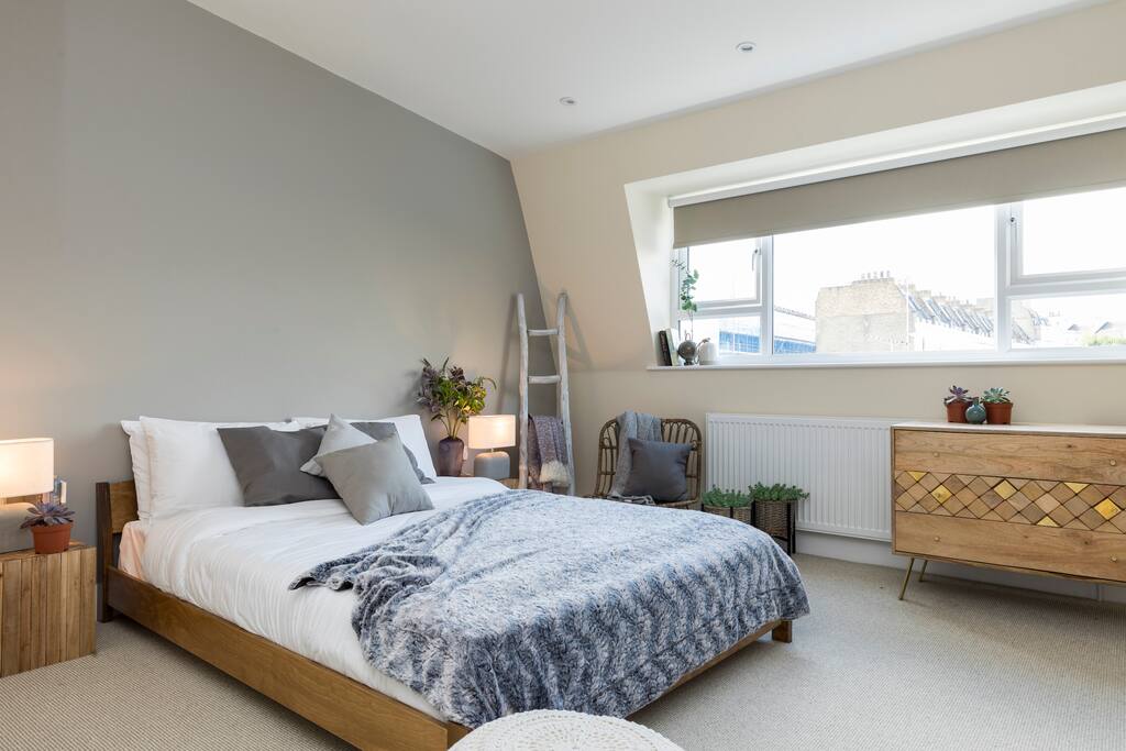 On the top floor you'll find the third double bedroom with an en suite bathroom.