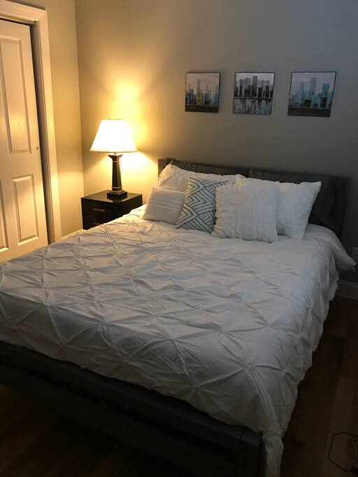 Closet space is available if needed. The VanDyck bedroom with queen bed.