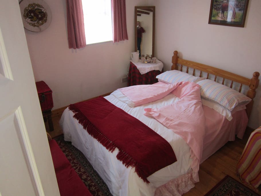 Double bed with plenty of room to add a single bed if required