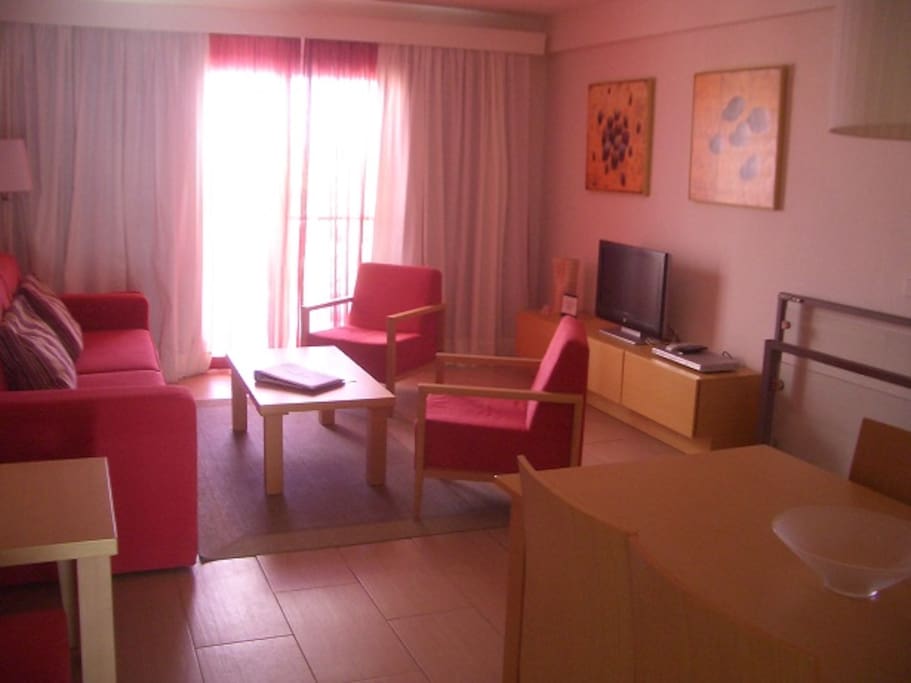 Livingroom with bed-settee for two, table and chairs for 6 persons, TV, hdmi, Radio/CD,