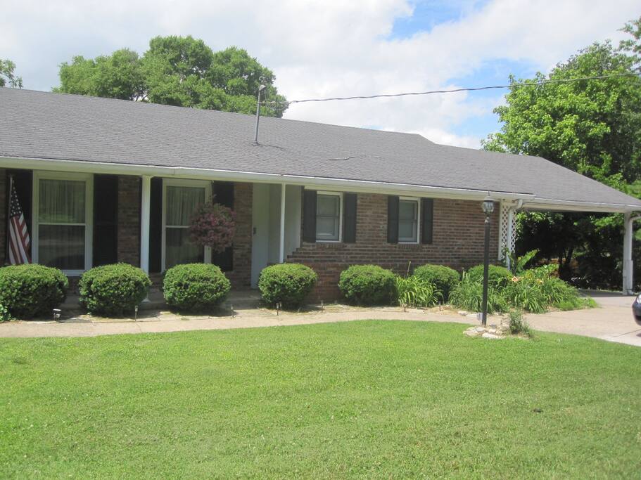 Outside view of the suite with a carport for your convenience.