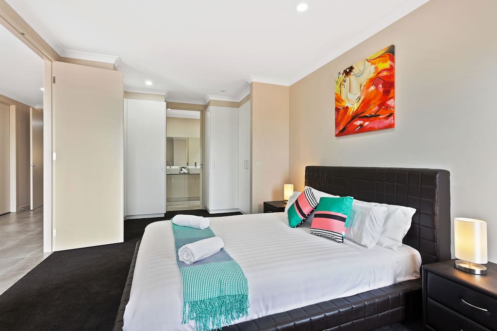 Master Bedroom with Queen Bed and an Ensuite with Shower