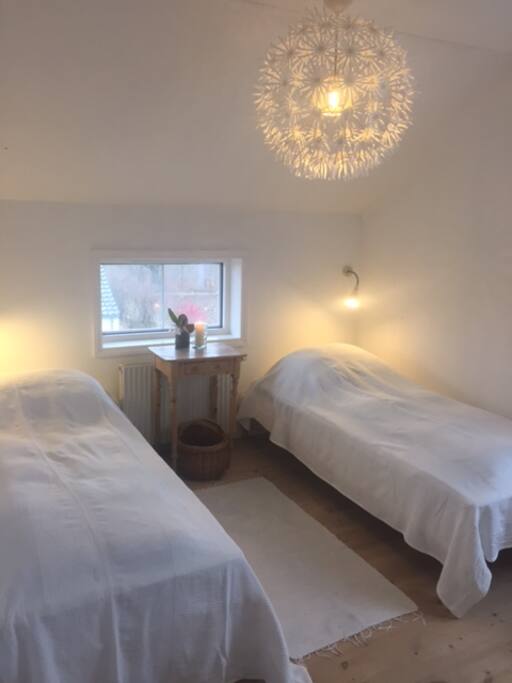 Cosy bedroom with two beds