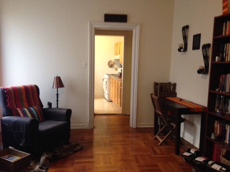Living room with lots of light. The table pulls out to seat four.