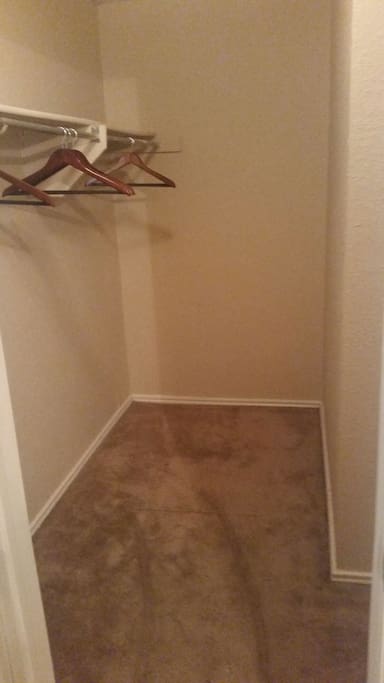Walk in Closet also extra Hanging space to the Right