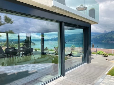 Modern accommodation with panoramic views of Lake Thun
