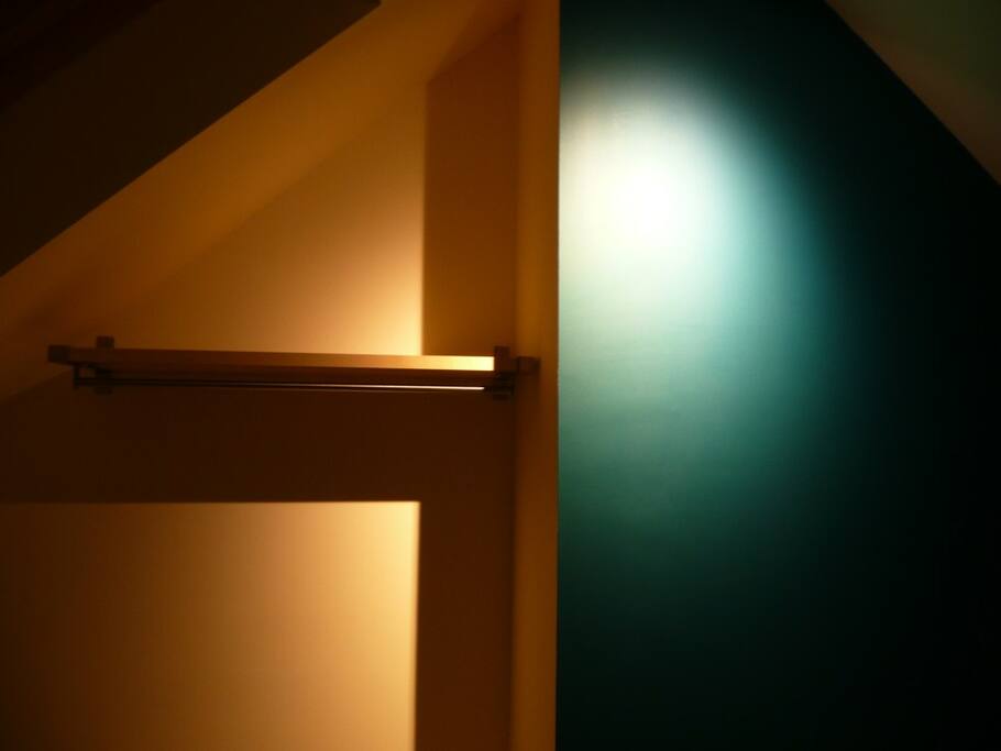 upstairs cosy sleeping with clothes rail