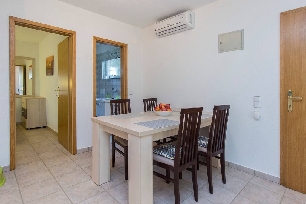 Dinning table, access in bedroom and bathroom, air condition