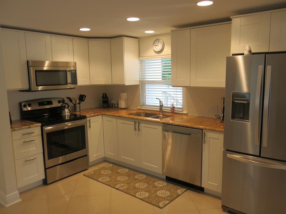 New kitchen with plenty of storage for your stay.