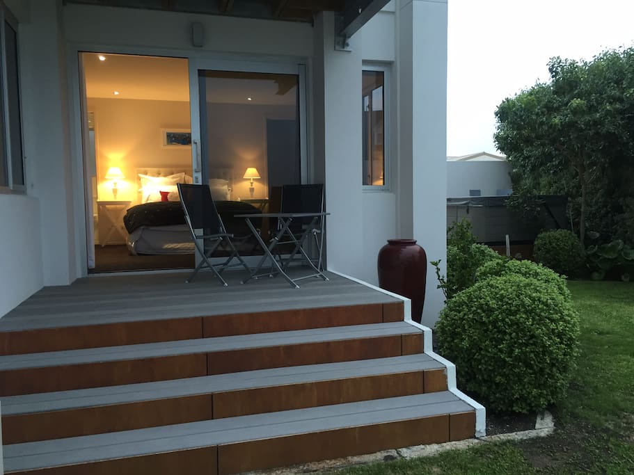 Outdoor patio off bedroom with views across Hawke's Bay