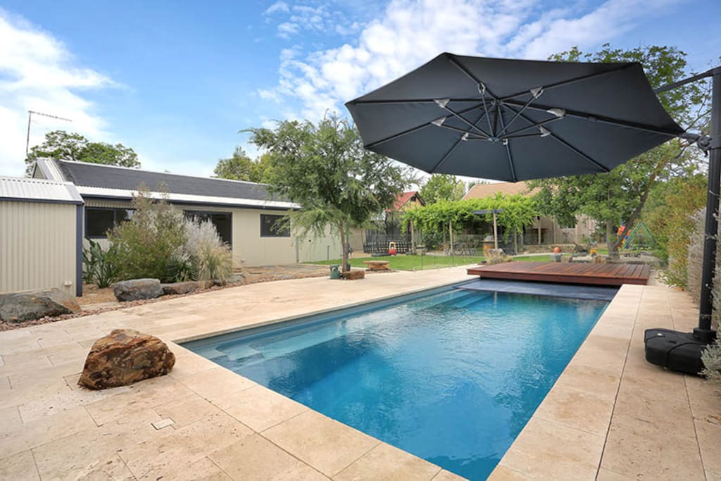 9x5 pool with deck and hard child safe cover.