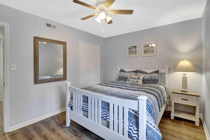 Bedroom 1 features queen size bed and t.v. with access to basic cable