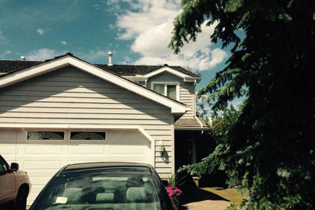1/15: Front of the house. Patio off master is just above the garage and is South Facing.