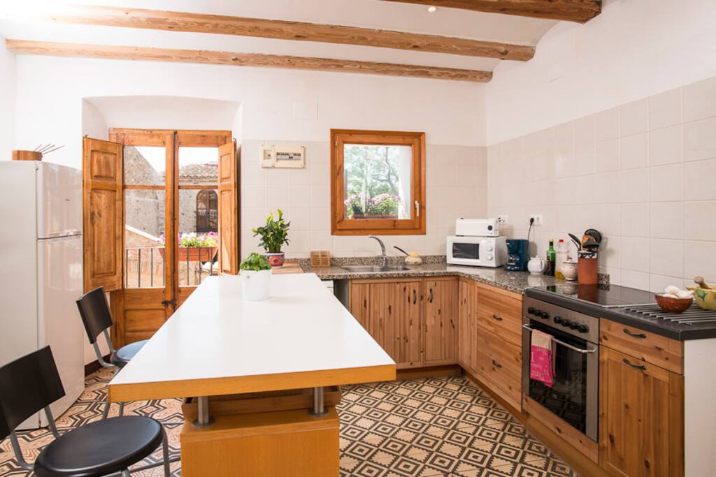 The well equipped kitchen is the focus of the social life of the house