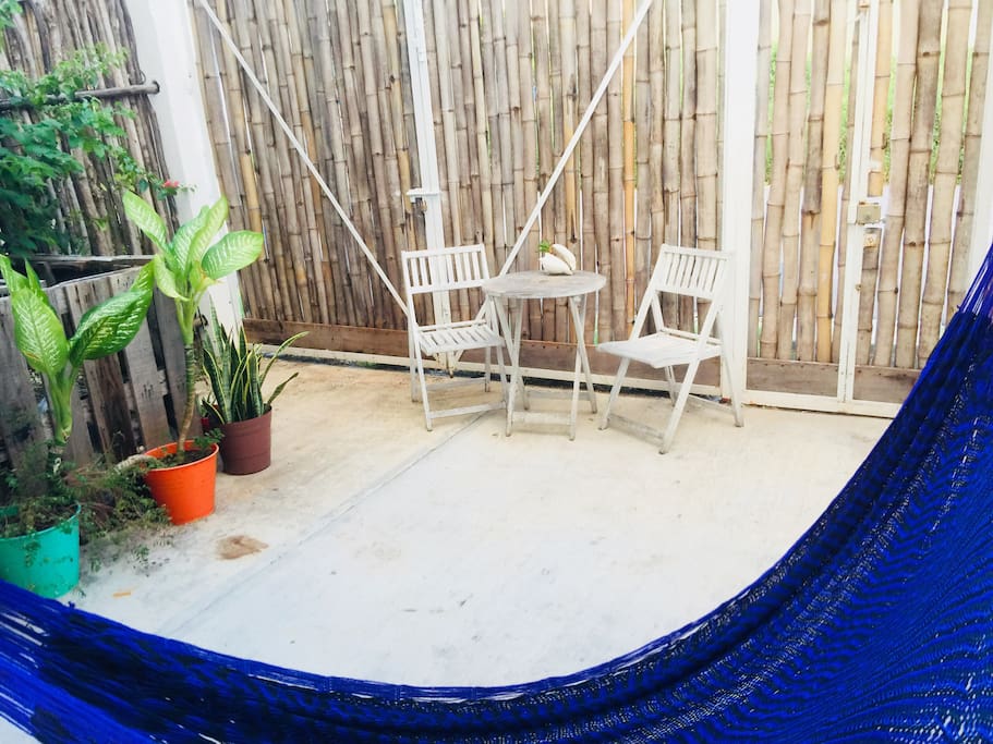 Relax in your hammock or have a cup of coffee on your breakfast table in your own private yard