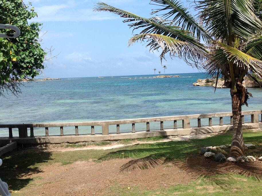 View of the sheltered coral bay from the bottom of the garden. Excellent for swimming