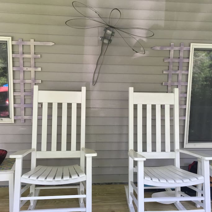 Large screened front porch with rockers, table/chairs -- perfect to sit out here with glasses of iced tea or "adult beverages"