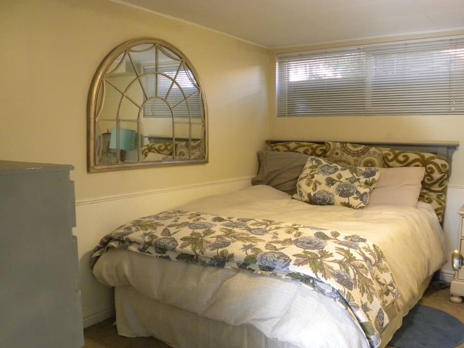 Cozy bedroom with ensuite bathroom.