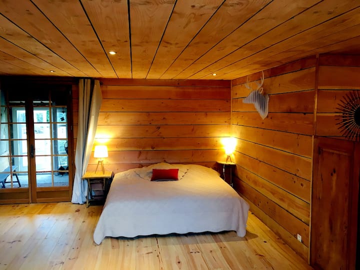 After crossing the first bedroom you will access the second bedroom with its cozy wood atmosphere, also equipped with a shower area and toilet