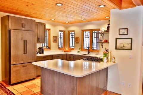 Chic adobe with lux amenities on 2 lush acres