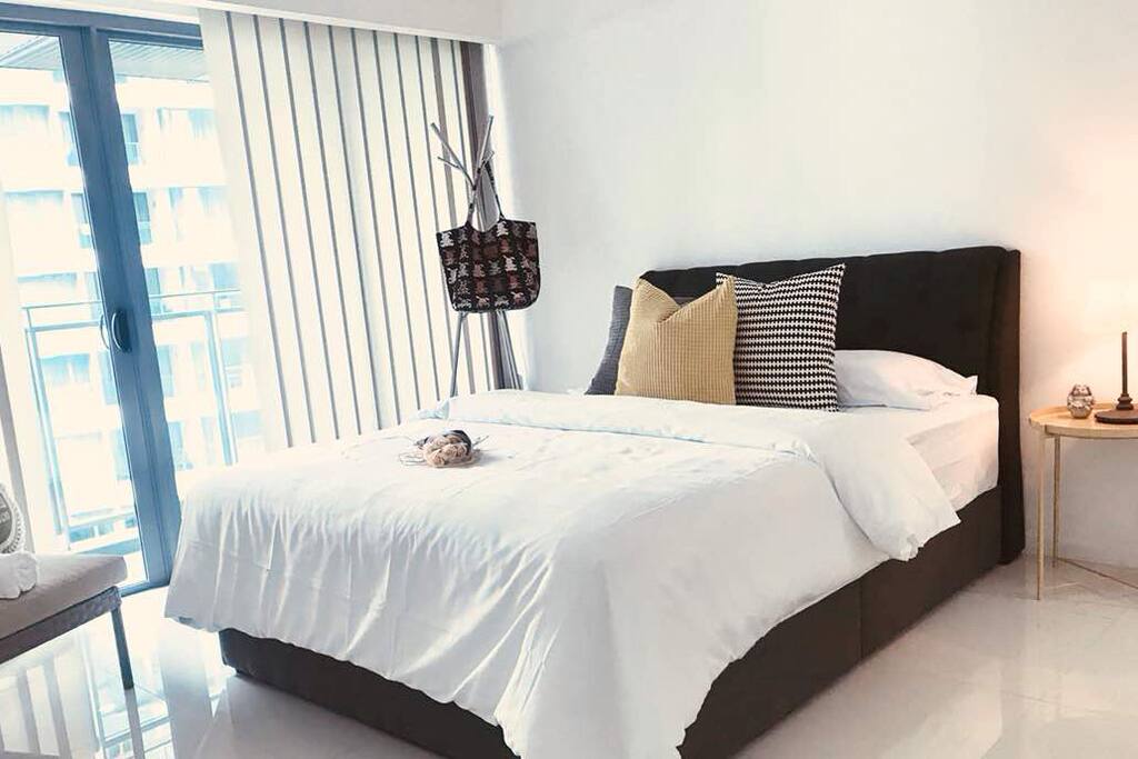 Modern, Bright, Clean Room with balcony.