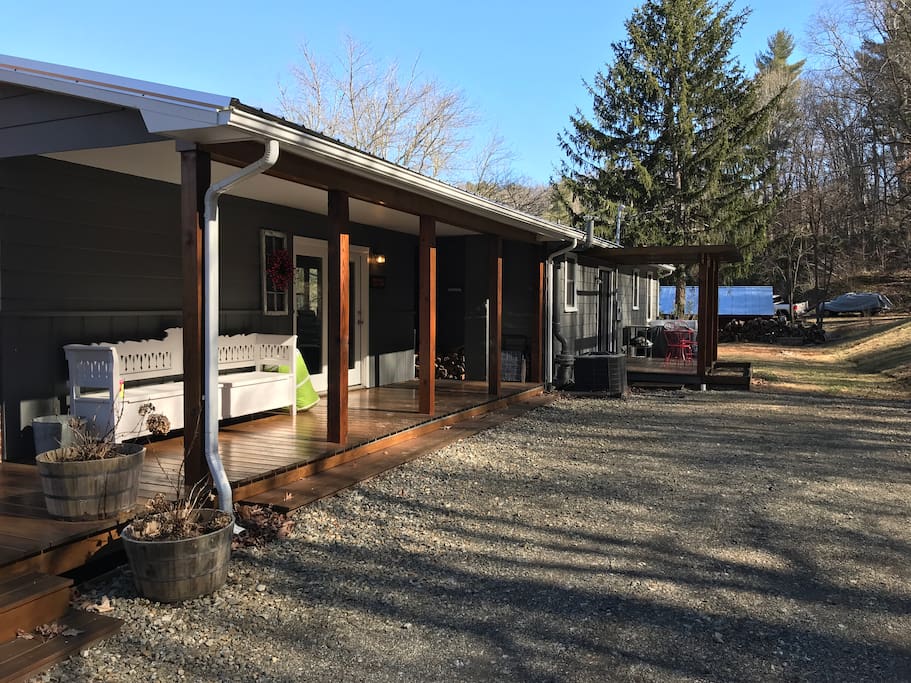 Back view, main entrance next to parking, small pergola off kitchen