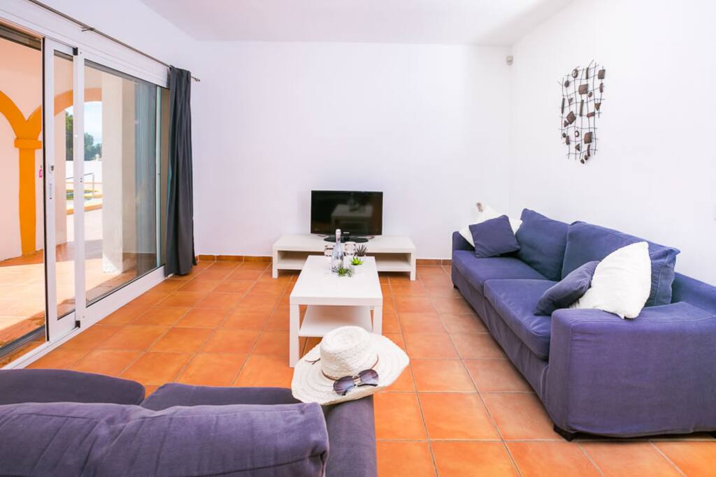 Spacious modern lounge - diner with LED TV and air con