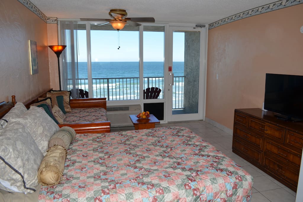 Oceanfront condo with queen size bed and 2 single beds and flatscreen TV with free HBO and Wifi access.