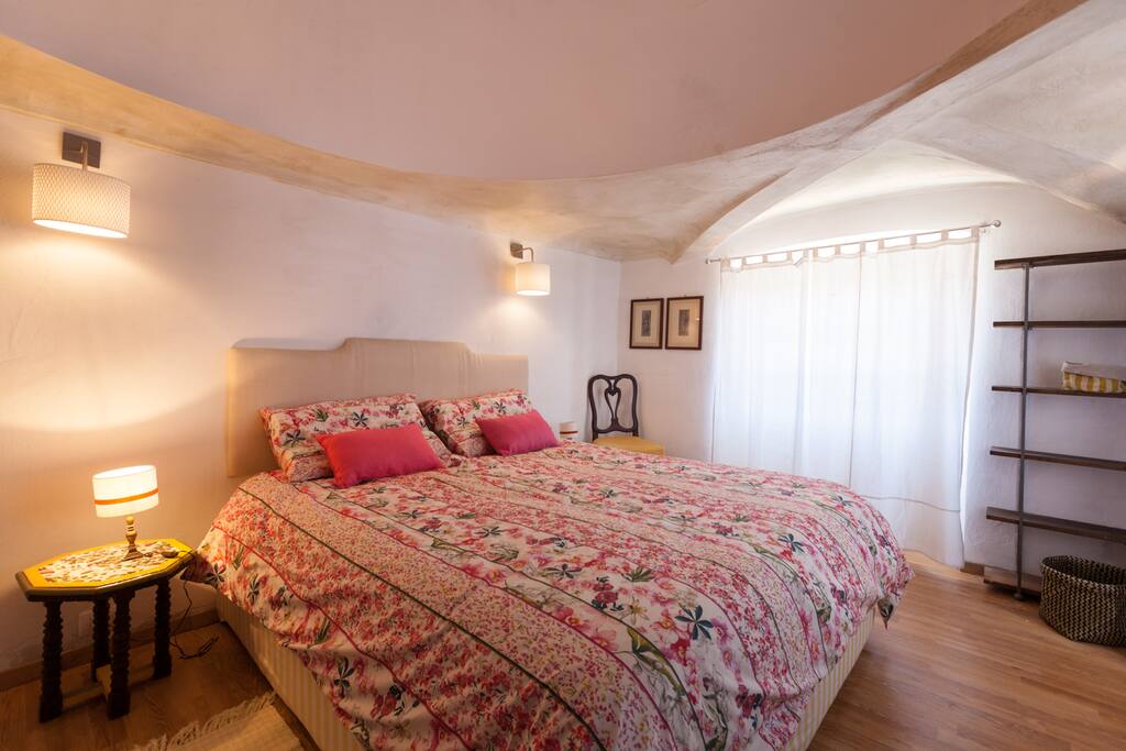 The Bedroom: the comfortable double bed with soft bed-linen