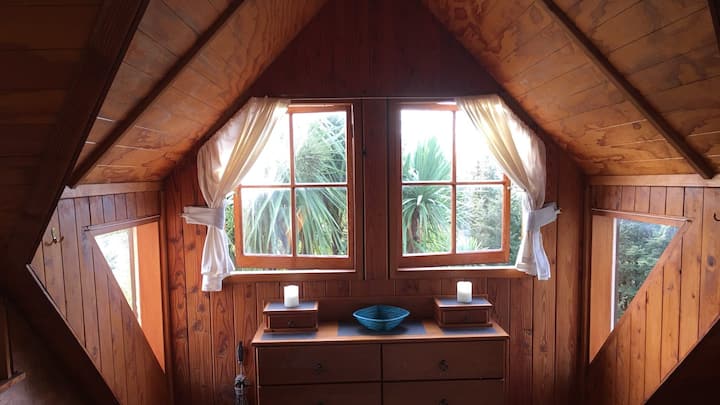 The master bedroom dormer windows with near and distant views to complement the settings.