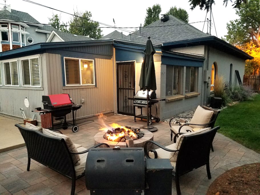 Roomy back yard is perfect for grilling, a game of cornhole, or enjoying S'mores by the fire pit.
