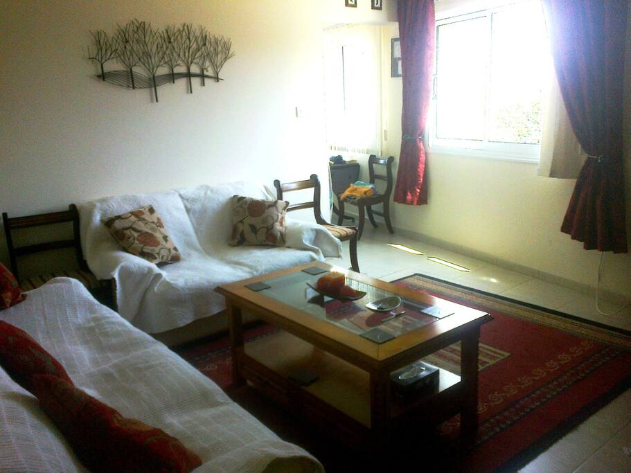 Lounge has a sunny aspect with blinds and curtains