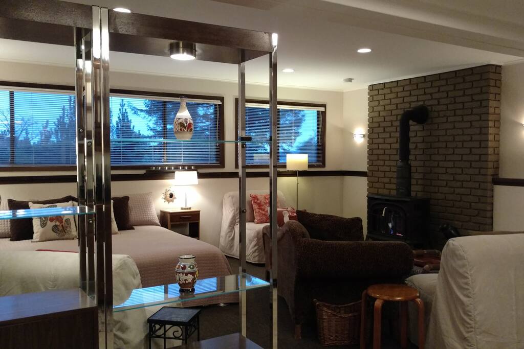 Comfy couch and three large chairs for lounging and luggage. WiFi included.