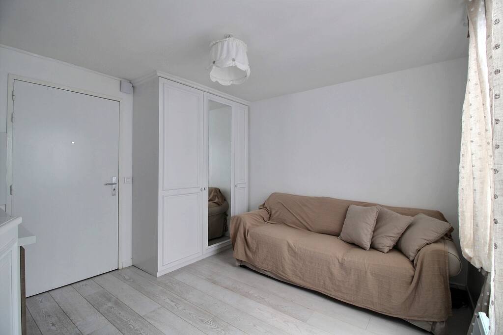 Living room with large sofa bed